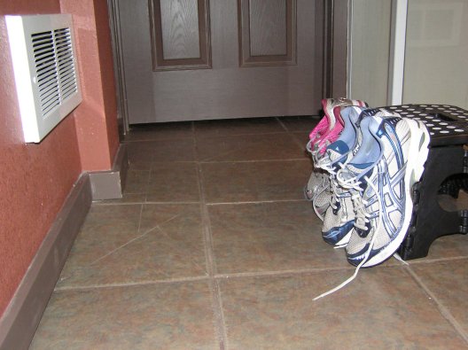 Trying to dry our shoes in front of the air vent :-P